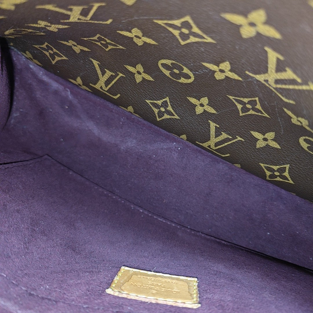 MONTAIGNE GM Monogram Coated Canvas Brown