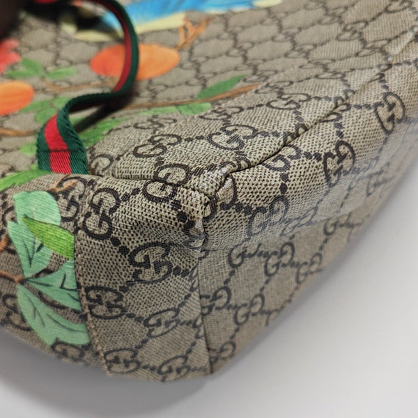 Tian Monogram Coated Canvas Brown