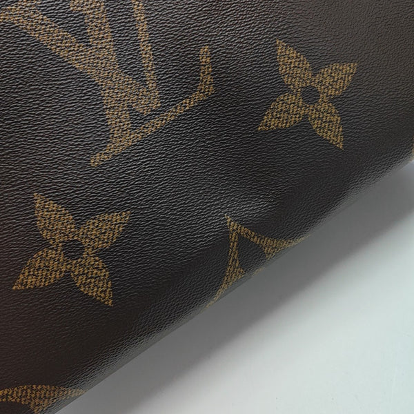 ONTHEGO MM Monogram Coated Canvas Brown
