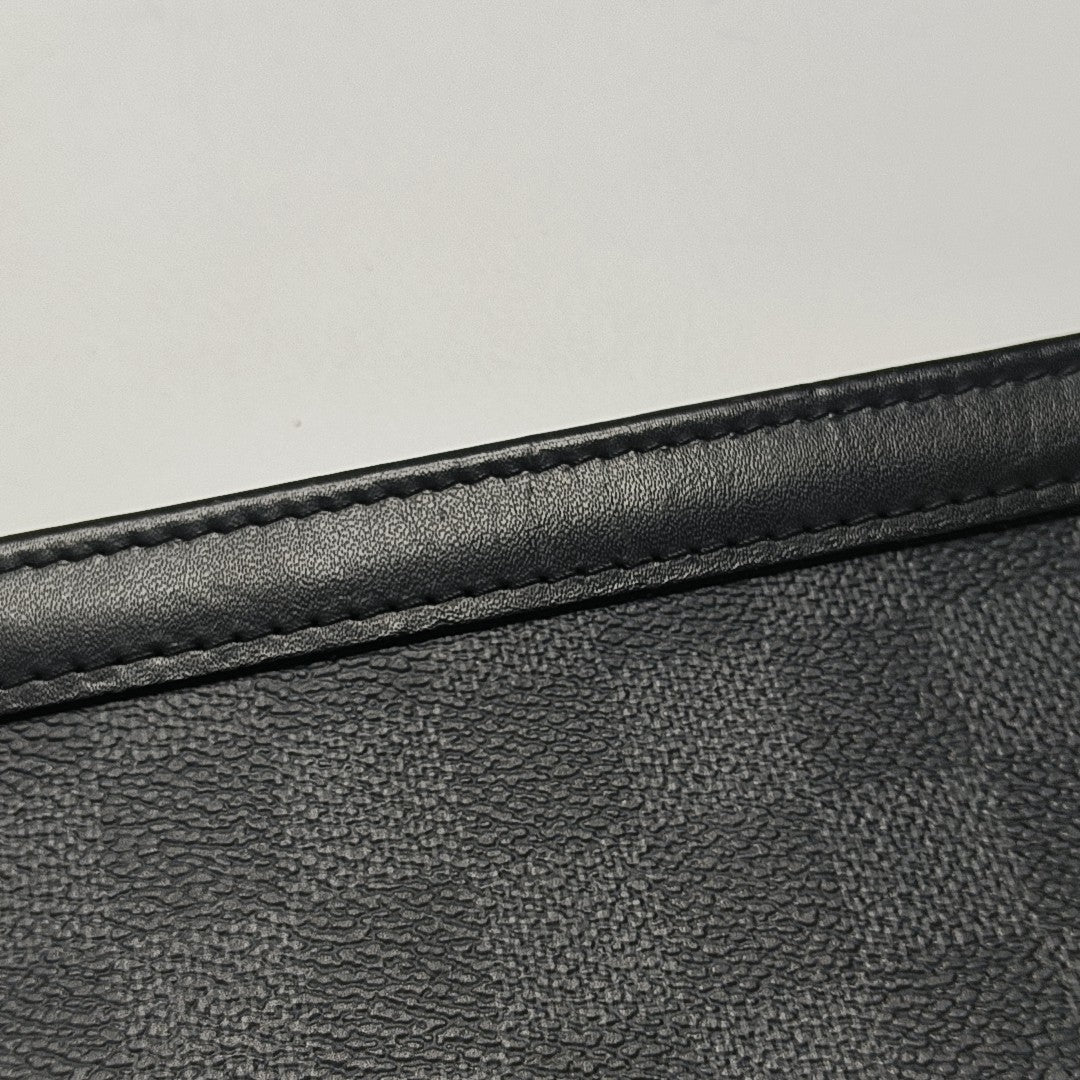 Pochette Voyag MM Damier Graphite Coated Canvas Gray