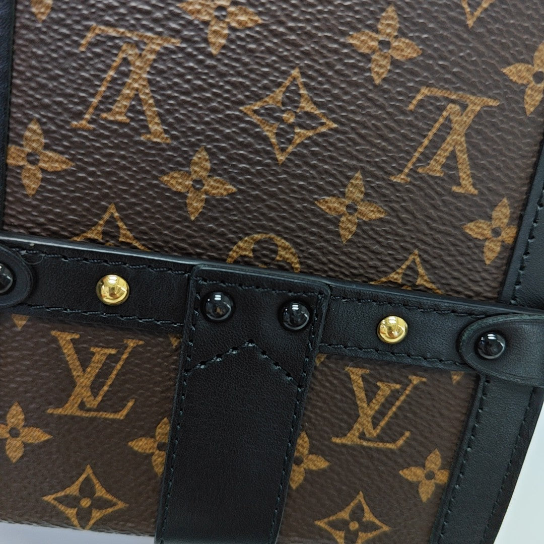 TRUNK Monogram Coated Canvas Brown