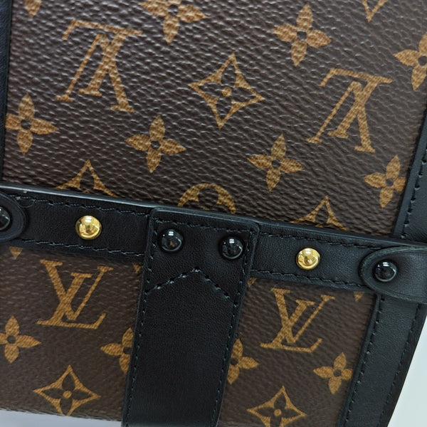 TRUNK Monogram Coated Canvas Brown