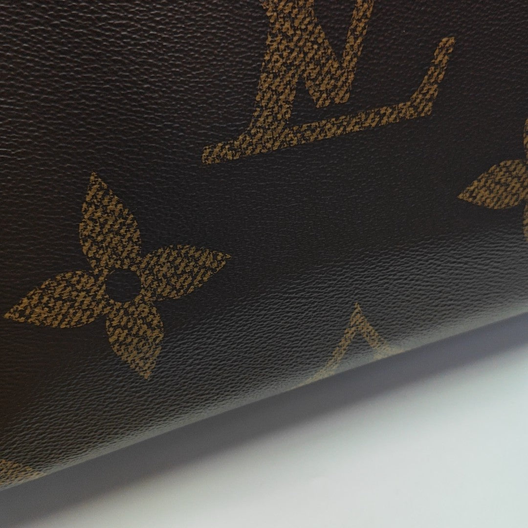 ONTHEGO MM Monogram Coated Canvas Brown