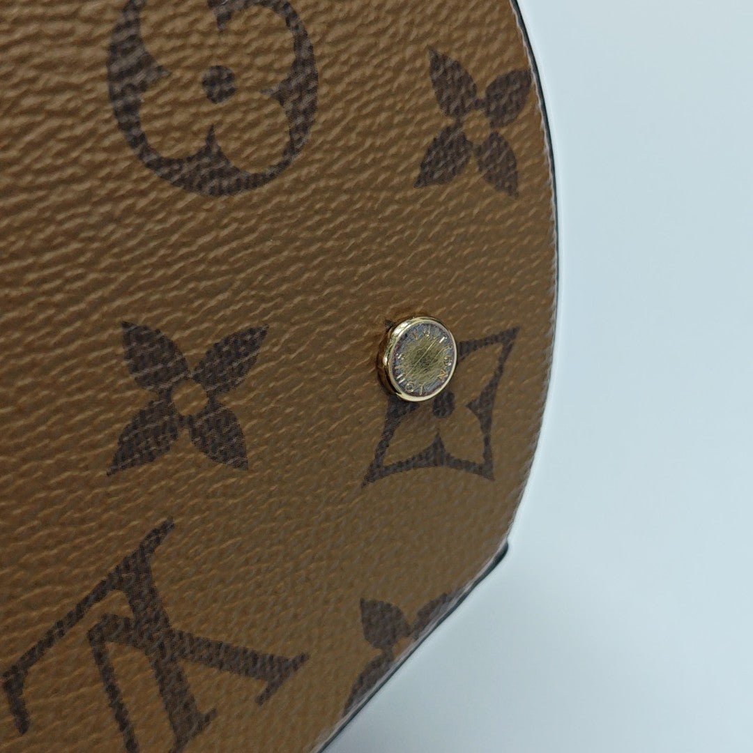 CANNES PM Monogram Coated Canvas Brown