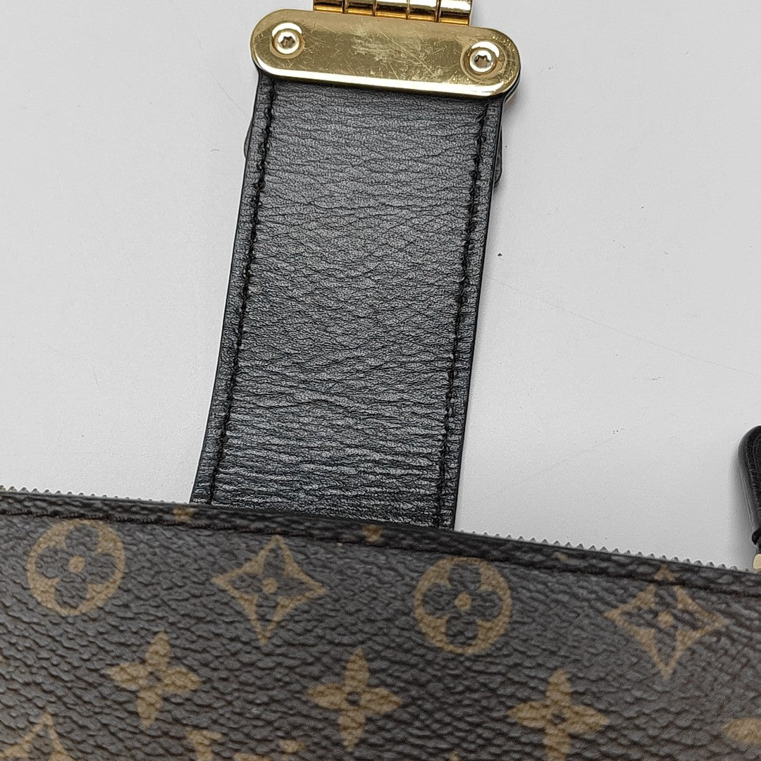 TRUNK Monogram Coated Canvas Brown