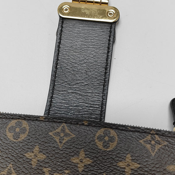 TRUNK Monogram Coated Canvas Brown