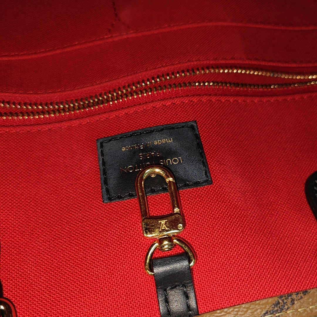ONTHEGO MM Monogram Coated Canvas Brown