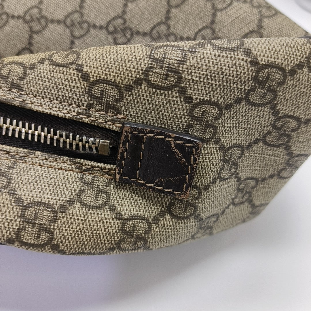 Monogram Coated Canvas Clutch Brown