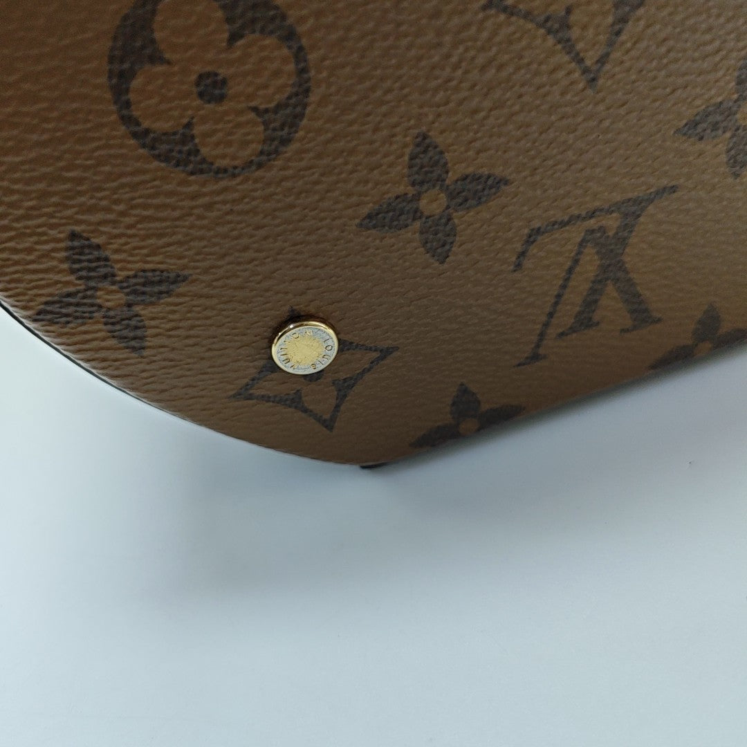 CANNES PM Monogram Coated Canvas Brown