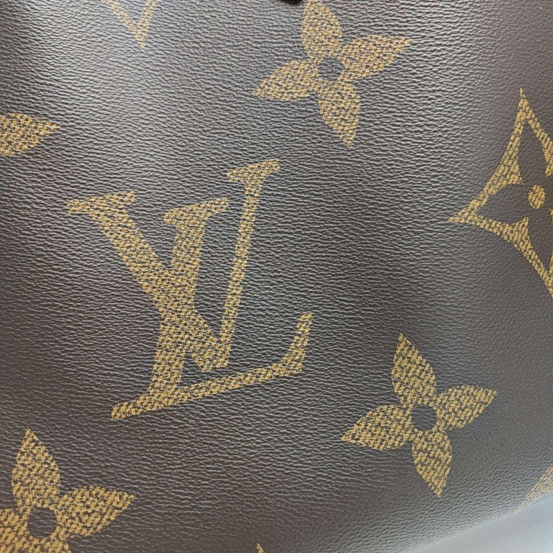 ONTHEGO GM Monogram Coated Canvas Brown