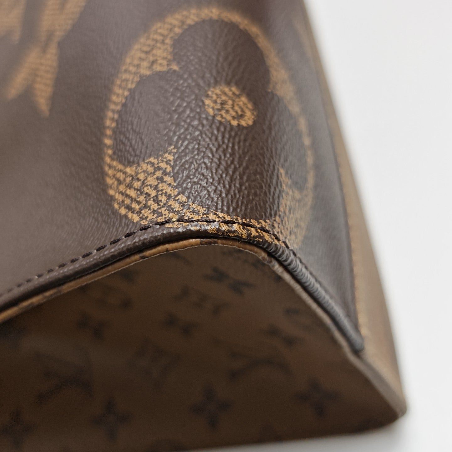 ONTHEGO MM Monogram Coated Canvas Brown