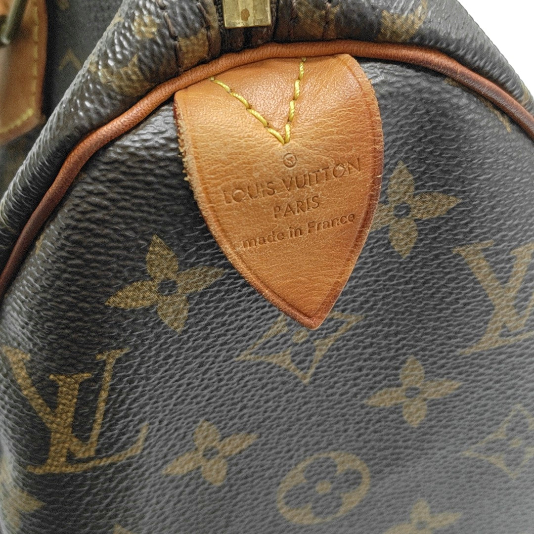 SPEEDY 25 Monogram Coated Canvas Brown