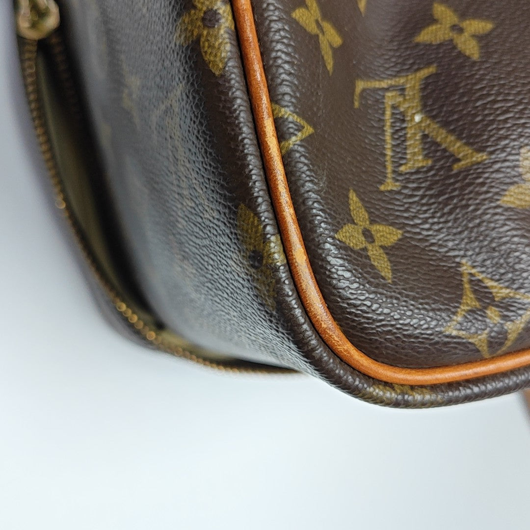 SIRIUS Monogram Coated Canvas Brown