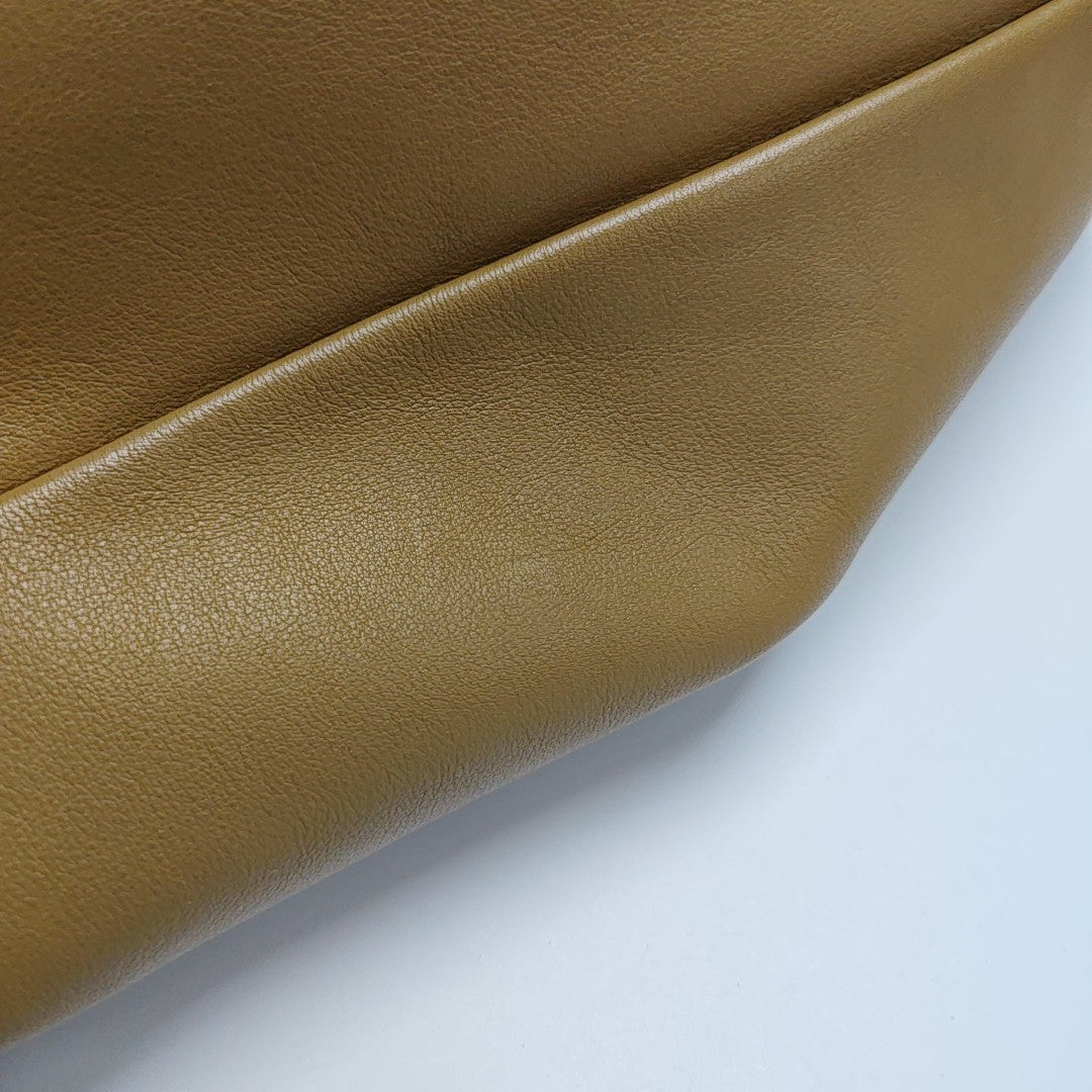 Authenticated pre-owned  The Pouch Calfskin Brown - Top Handle Bag at Looply