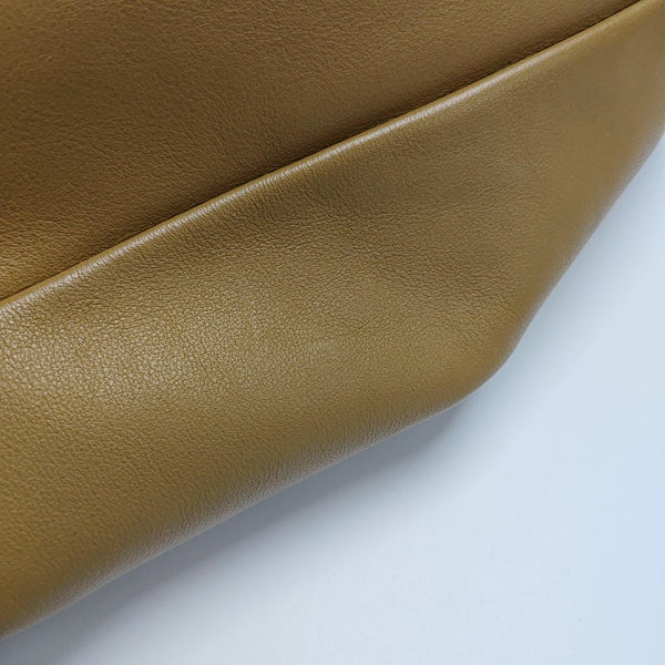Authenticated pre-owned  The Pouch Calfskin Brown - Top Handle Bag at Looply