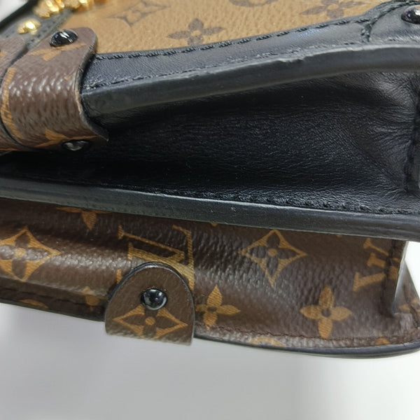 TRUNK Monogram Coated Canvas Brown