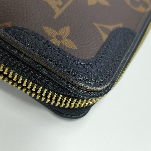 Monogram Coated Canvas Clutch Brown