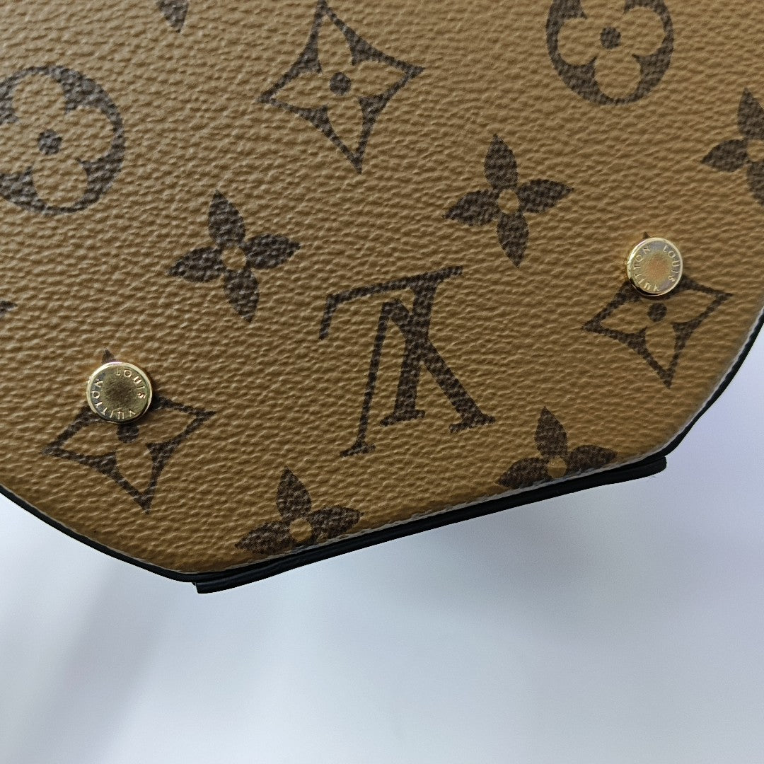 CANNES PM Monogram Coated Canvas Brown