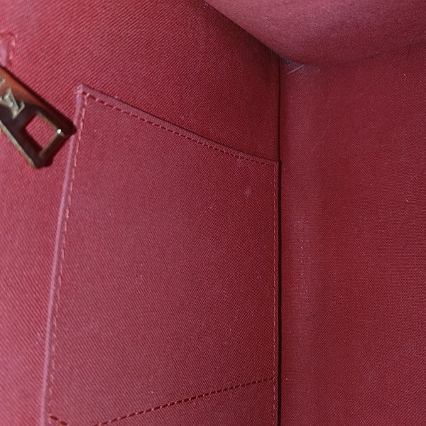 ONTHEGO MM Monogram Coated Canvas Brown