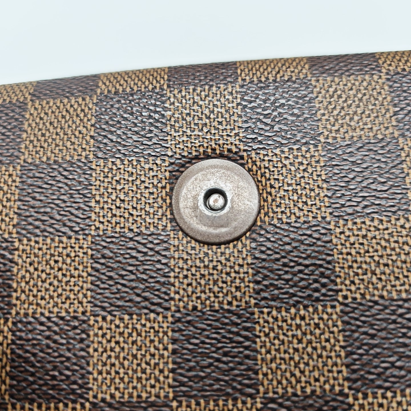 TRIBECA Damier Ebene Coated Canvas Brown