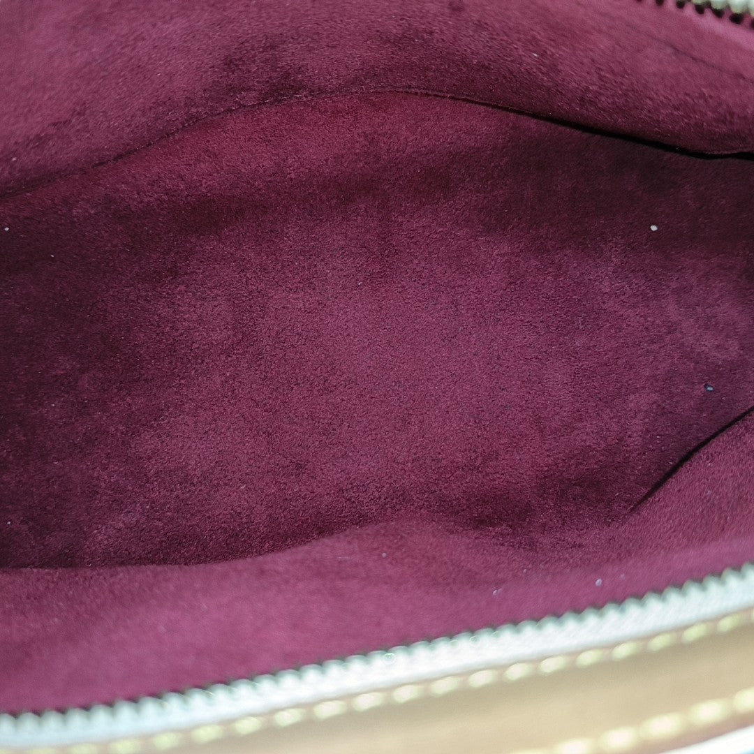 LV × TM ELIZA Monogram Coated Canvas White