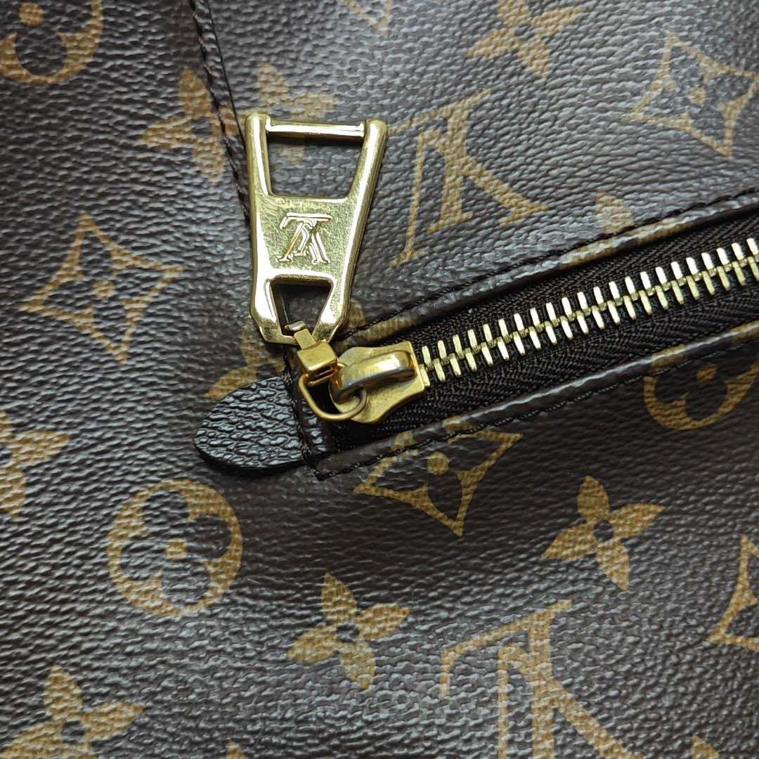 MELIE Monogram Coated Canvas Brown