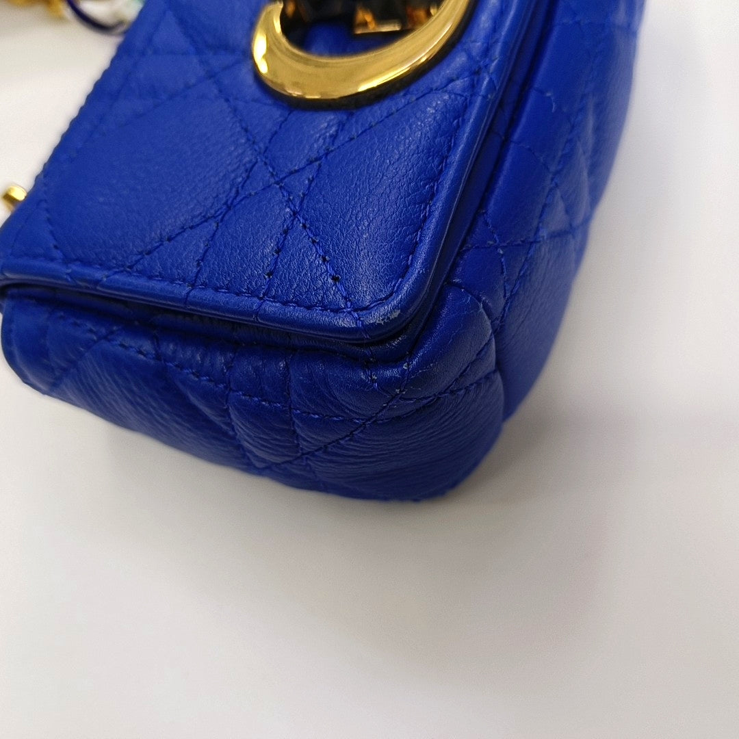 Authenticated pre-owned  Dior Caro Super Mini Quilted Calfskin Blue - Shoulder Bag at Looply