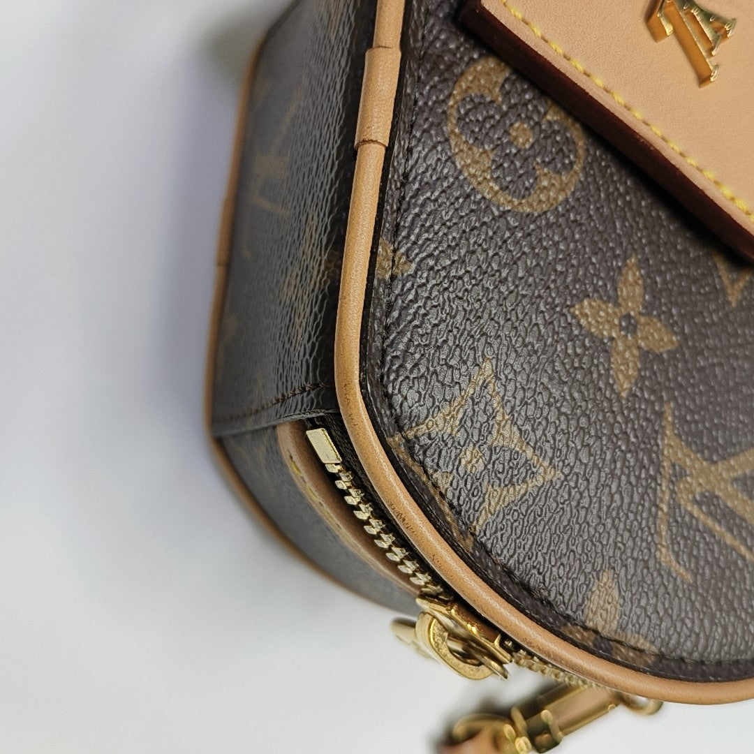 BOITE CHAPEAU Mini Monogram Coated Canvas Brown