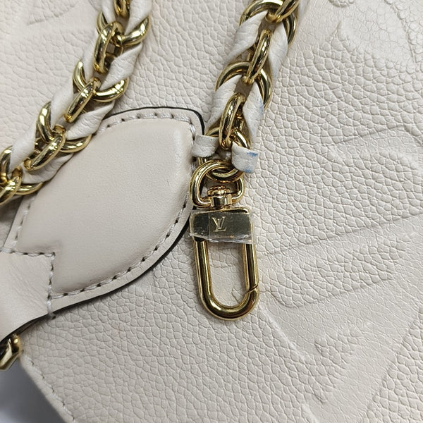 ONTHEGO EAST WEST Monogram Calfskin Beige