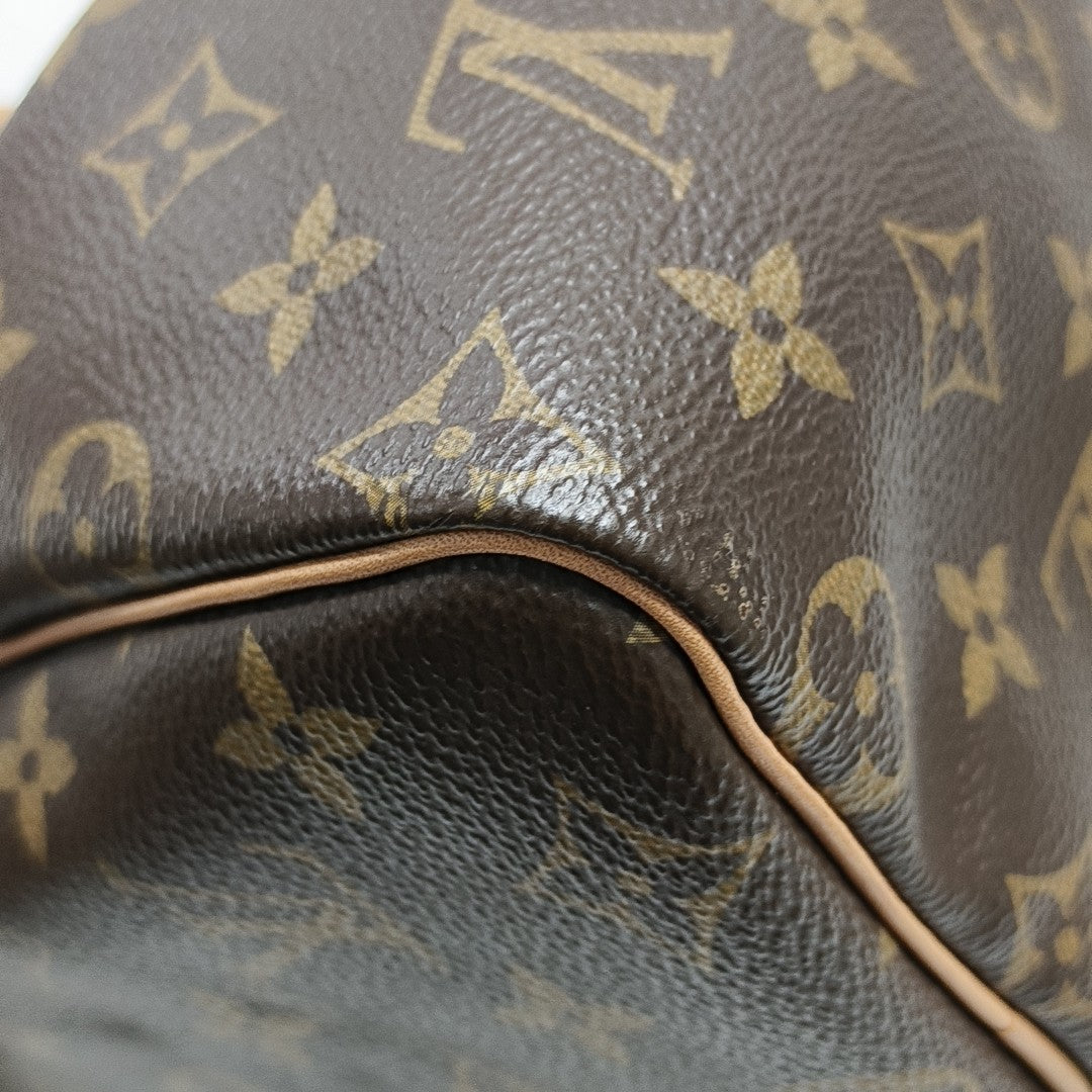 SPEEDY 25 Monogram Coated Canvas Brown