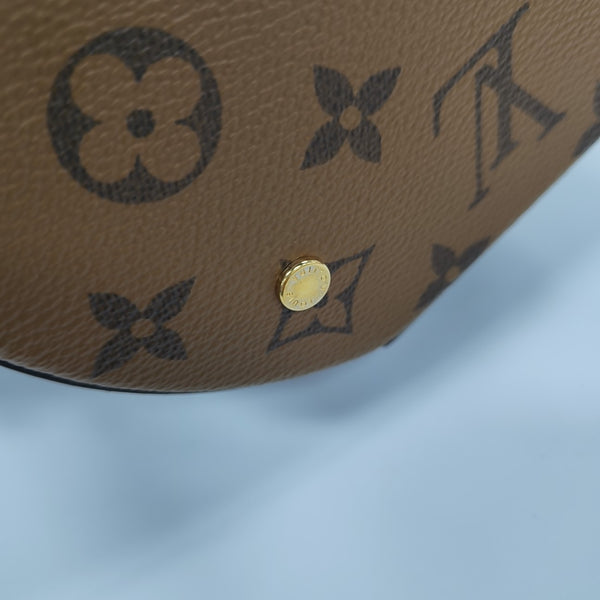 CANNES PM Monogram Coated Canvas Brown