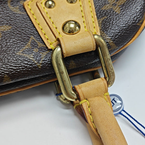 MANHATTAN PM Monogram Coated Canvas Brown
