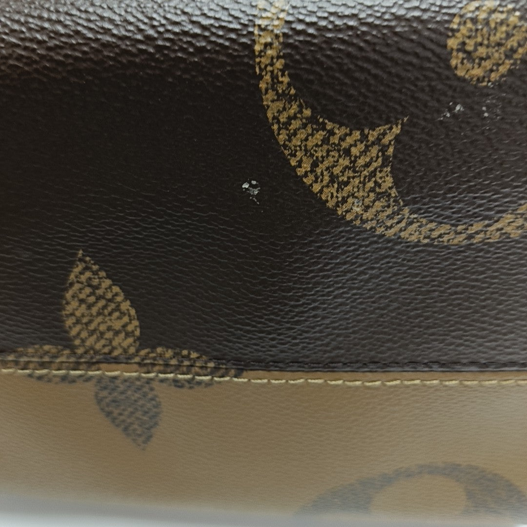 ONTHEGO MM Monogram Coated Canvas Brown