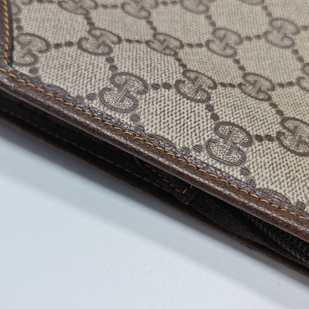 Monogram Coated Canvas Clutch Beige