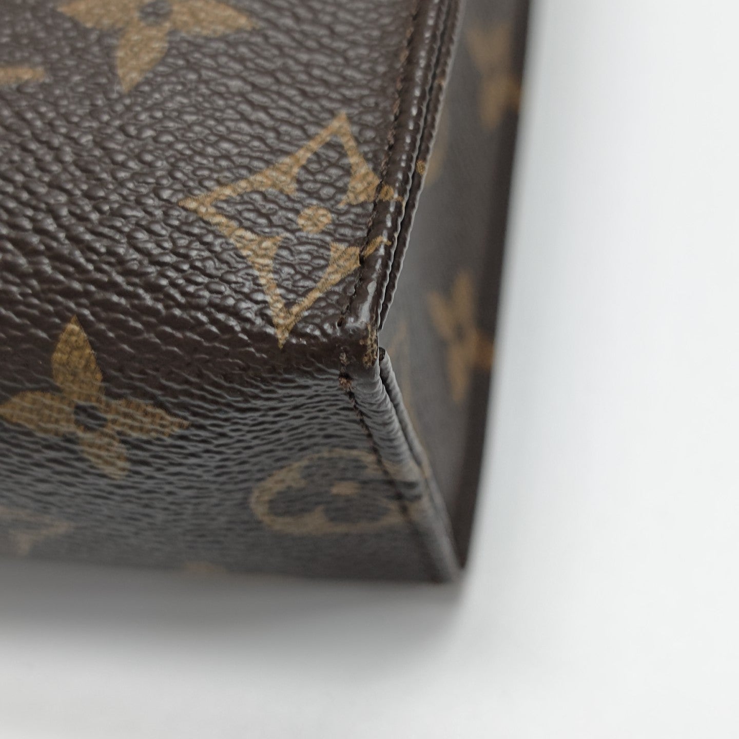 TOILET POCKET 26 Monogram Coated Canvas Brown
