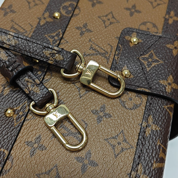 PETITE MALLE Monogram Coated Canvas Brown