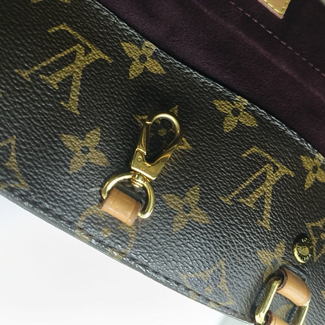 MONTAIGNE GM Monogram Coated Canvas Brown