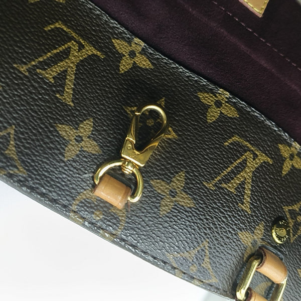 MONTAIGNE GM Monogram Coated Canvas Brown