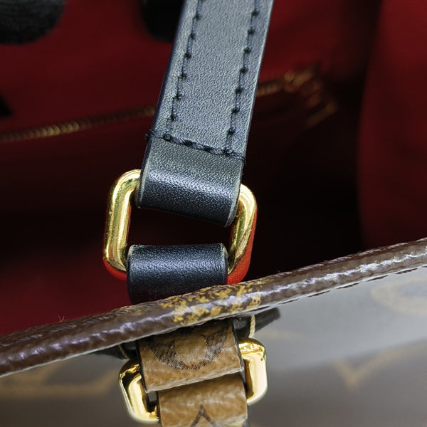 ONTHEGO GM Monogram Coated Canvas Brown