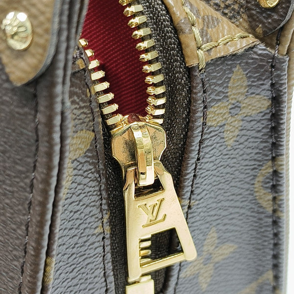 ONTHEGO EAST WEST PM Monogram Coated Canvas Brown