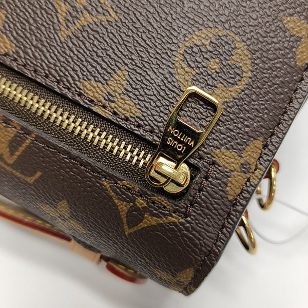 MÉTIS EAST WEST Monogram Coated Canvas Brown