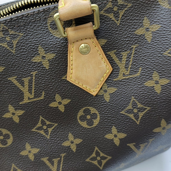 SPEEDY 25 Monogram Coated Canvas Brown