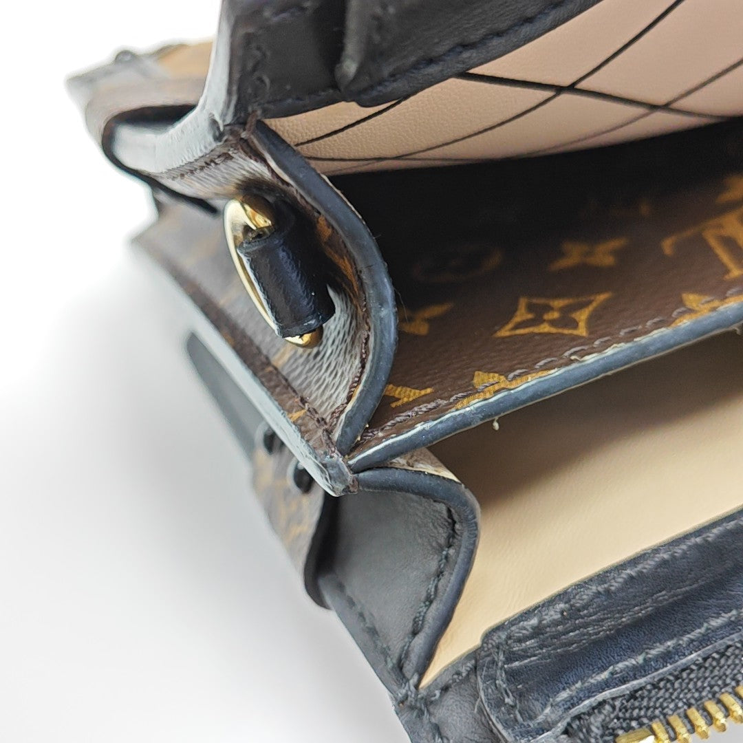 TRUNK Monogram Coated Canvas Brown