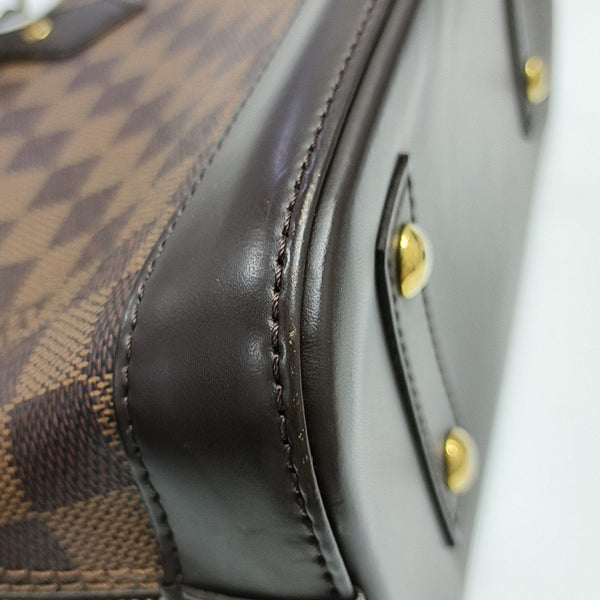ALMA BB Damier Ebene Coated Canvas Brown