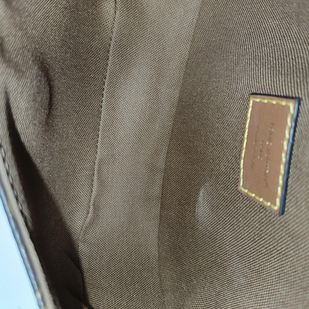 SAUMUR Monogram Coated Canvas Brown