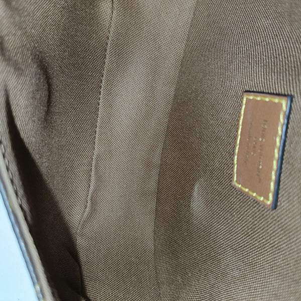 SAUMUR Monogram Coated Canvas Brown