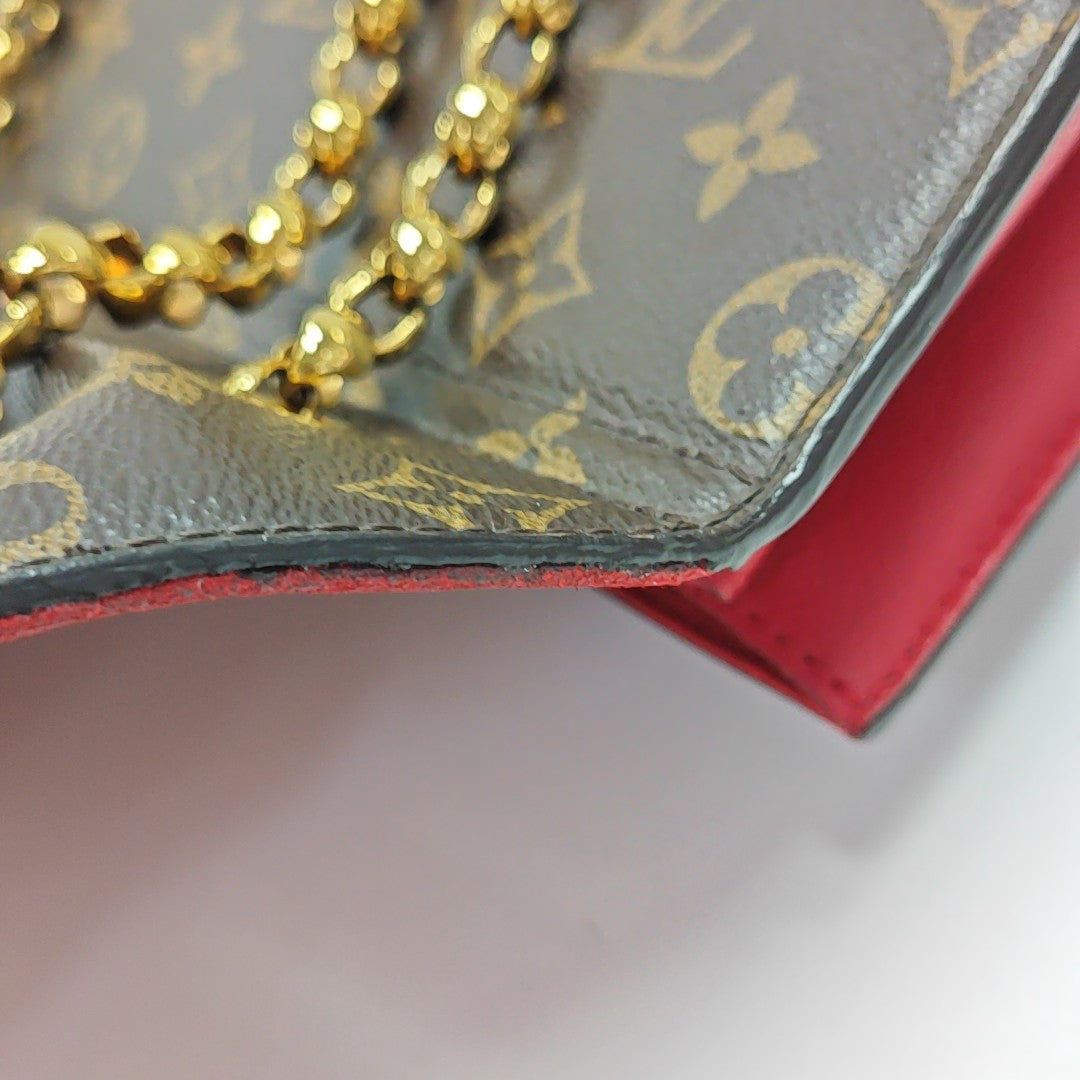 VICTOIRE Monogram Coated Canvas Brown