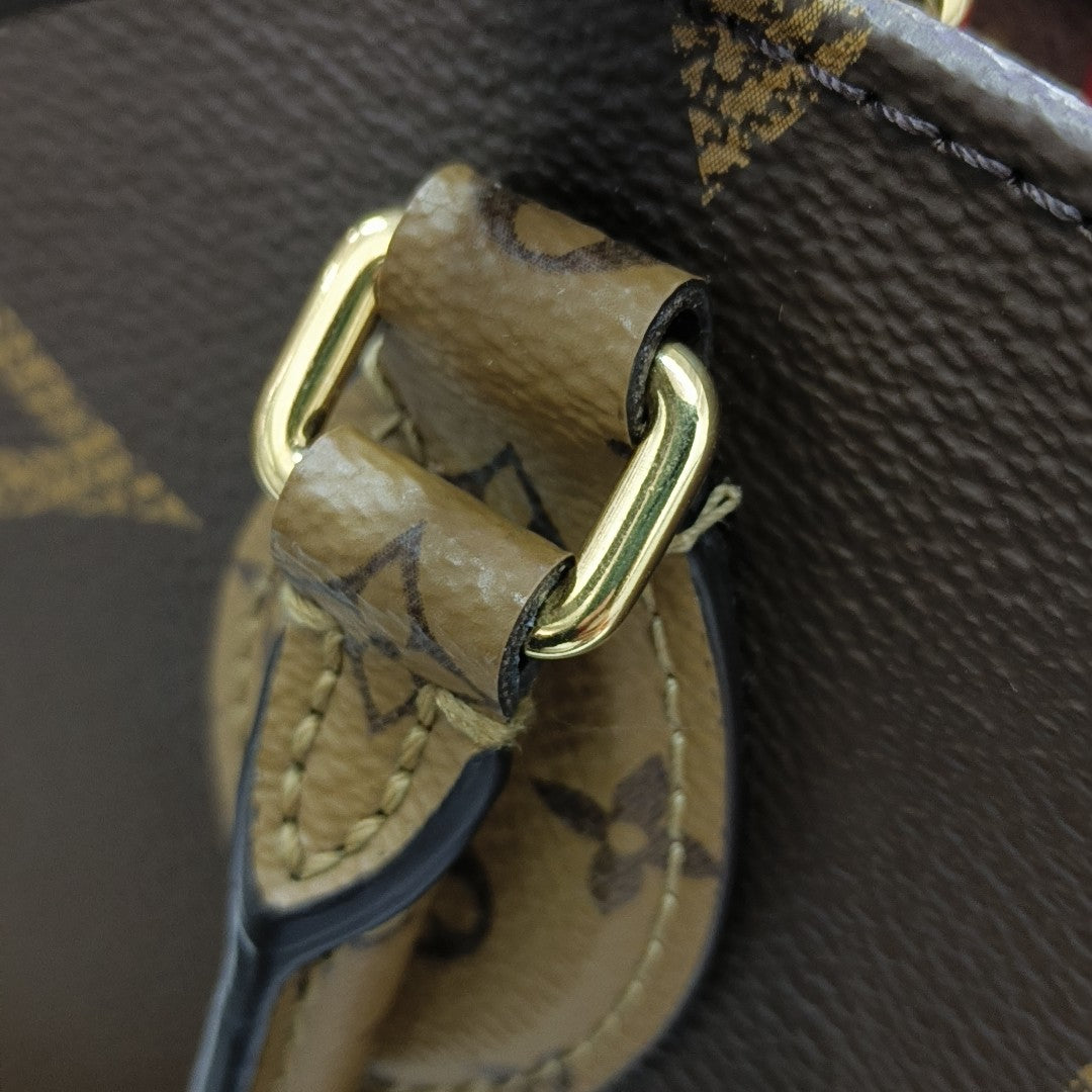 ONTHEGO GM Monogram Coated Canvas Brown