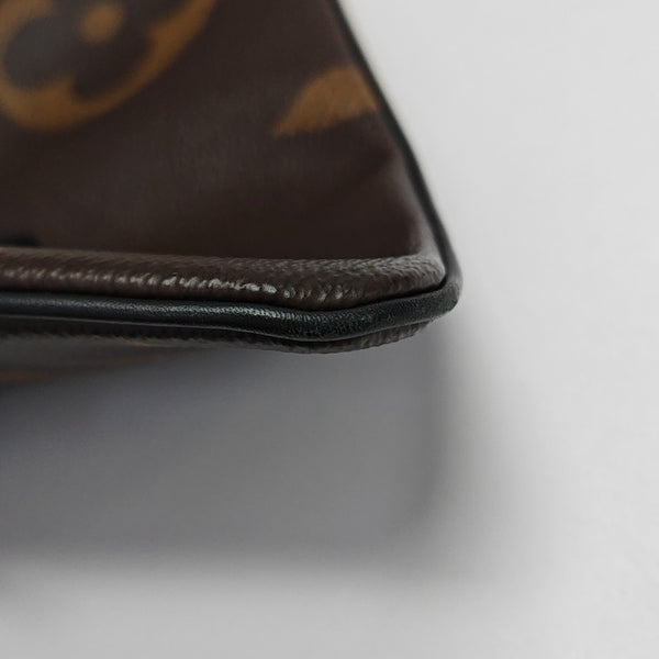 TRIO Monogram Coated Canvas Brown