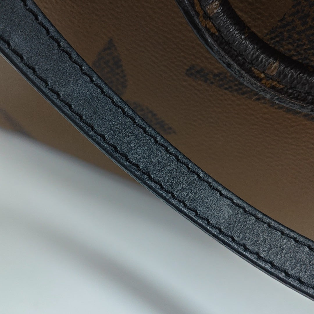 ONTHEGO MM Monogram Coated Canvas Brown